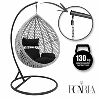 Fotel wiszący huśtawka kokon z czarnymi poduszkami