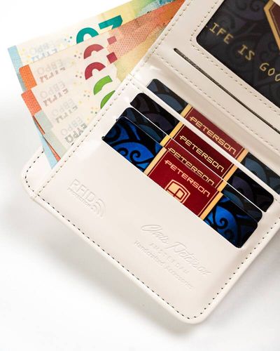 mały portfel damski ze skóry ekologicznej na zatrzask i suwak - peterson na Arena.pl