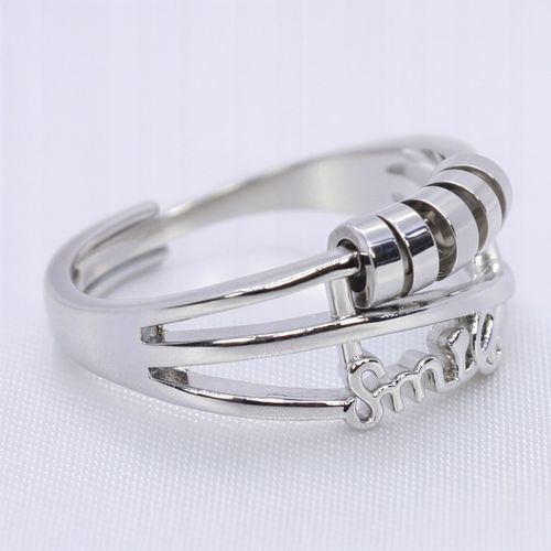 SREBRNY PIERŚCIONEK SMILE antystresowy stal chirurgiczna ruchome krążki na Arena.pl