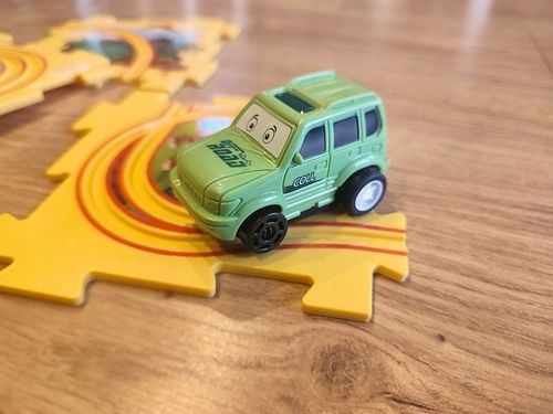 TOR SAMOCHODOWY KREATYWNE PUZZLE DINOZAUR PARK AUTKO 15 el. PUZZLE RAIL CAR na Arena.pl