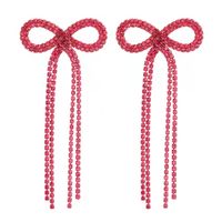 Kolczyki różowe kokardy z cyrkonii długie wiszące na bal studniówkę