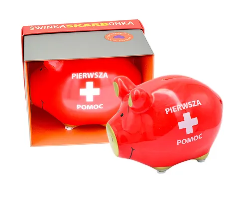 Skarbonka Świnka z napisem „PIERWSZA POMOC” na Arena.pl