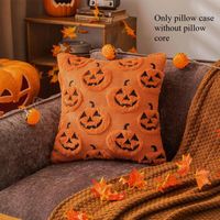 Poszewka na poduszkę pomarańczowa z motywem dyni Halloween