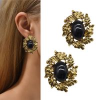 ZŁOTE kolczyki z listkami CZARNY kamień na wyjście damskie modne stylowe