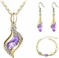 Złoty komplet biżuterii łezki liliowe cyrkonie pozłacane migdały na prezent
