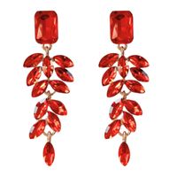 Czerwone eleganckie kolczyki wieczorowe na eleganckie przyjęcie złote