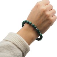 Bransoletka na gumce - malachit kulki 8,5 mm i srebro 20 cm