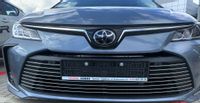 TOYOTA COROLLA E21 - Listwy CHROM na GRILL zderzak