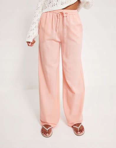 NELLY POMARAŃCZOWE LUŹNE SPODNIE LEN PR3 NG5__S na Arena.pl