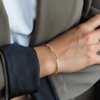 Bransoletka urodzeniowa kwiecień - opal różowy, złoty hematyt i srebro złocone