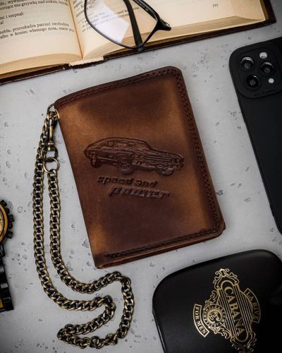 duży, skórzany portfel męski z łańcuszkiem na Arena.pl