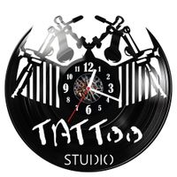 Zegar ścienny z płyty winylowej Studio Tatuażu 541.14
