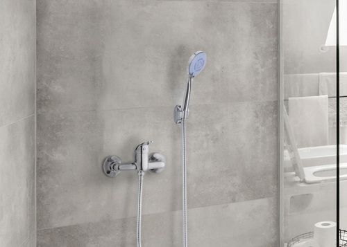 Bateria prysznicowa srebrna ścienna jednouchwytowa ze słuchawką i wężem na Arena.pl