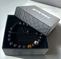 Bransoletka dla piłkarza chłopca regulowana na szczęście ferale oko tygrysa