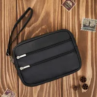 saszetka męska skórzana do ręki kompaktowa klasyczna czarna abruzzo abr-40