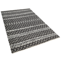 Dywan skórzany 140 x 200 cm czarny z beżowym FEHIMLI