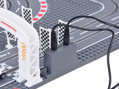 ZESTAW  WYŚCIGOWY TOR Z KLOCKÓW 2 AUTA NA PILOTA na Arena.pl