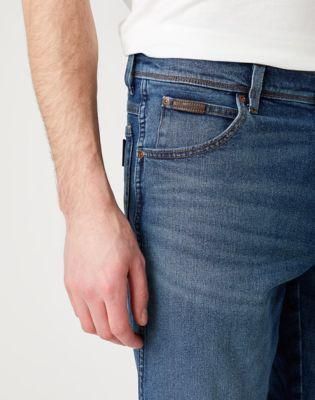 MĘSKIE SPODNIE JEANSOWE WRANGLER TEXAS SLIM THE GURU W12SU551H W38 L30 na Arena.pl