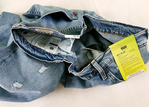 Męskie jeansy Levi's 511 -Slim Stretch 045115465 Levis dziury oryg. W36/L36 na Arena.pl