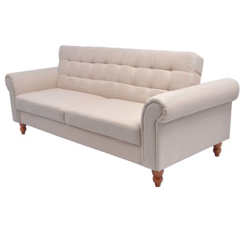 Sofa z kremowego materiału na Arena.pl