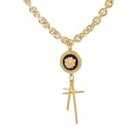 naszyjnik 2 krzyże i moneta (c15/mon/64au)