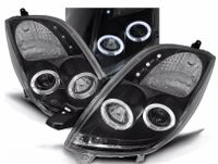 LAMPY REFLEKTORY TOYOTA YARIS 2006-2009 RINGI BLACK Soczewki NOWE Komplet