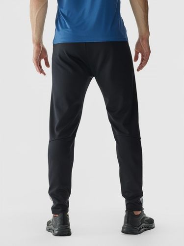 Męskie spodnie treningowe 4F 4FWAW24TFTRM683 - czarne na Arena.pl