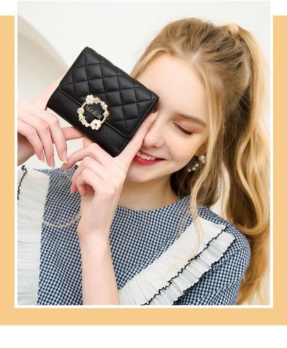 Nucelle elegancki niebieski portfel na Arena.pl