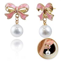 kolczyki wiszące, efektowne perłowe kule z kokardkami, k1691