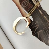 Naszyjnik Stal Chirurgiczna Literka Platerowana Złotem Nst100C