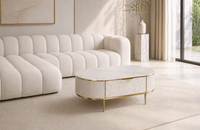 Kremowy stolik kawowy glamour Champion z muszlami i spiekiem 122x71x45