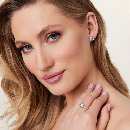 srebrne kolczyki z błękitną cyrkonią na Arena.pl