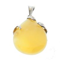 Zawieszka z mlecznym Bursztyem w srebrze oksydowanym.