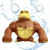 Goryl ściska lalkę wydechową, aby złagodzić stresStatuetka goryla