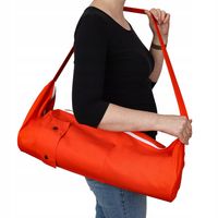 Pomarańczowa bawełniana torba na matę do jogi. Pojemna i praktyczna.