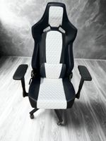 FOTEL GAMINGOWY OBROTOWY BIAŁO CZARNY Z REGULOWANYMI PODŁOKIETNIKAMI F1