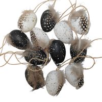 Jajka zawieszki biało czarne piórka 12 szt