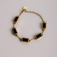 bransoletka z czarną cyrkonią pozłacana luminoir (b25/vic/01au)