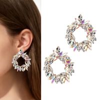 Złote kolczyki koła z cyrkoniami błyszczącymi wizytowe eleganckie błysk