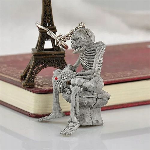 Breloczek NIe Pal Śmierć na Tronie Kościotrupek 3D Wucecik Kostucha Fajka na Arena.pl