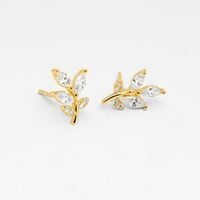 Kolczyki sztyfty pozłacane ANIA KRUK złote listki białe cyrkonie srebro 925