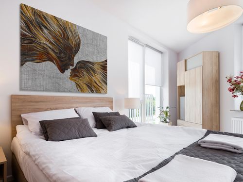 13503 Obraz na płótnie TWARZE BRĄZOWY POSTACI na Arena.pl