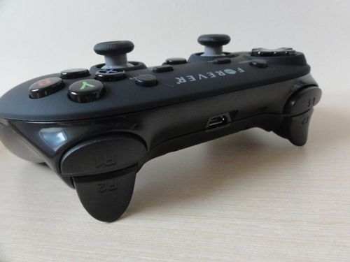 Gamepad bluetooth z uchwytem na telefon na Arena.pl