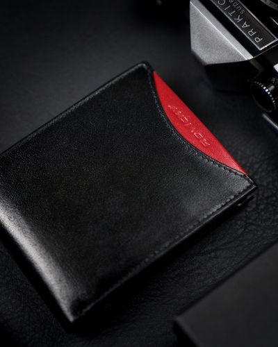 cienki portfel męski z naturalnej skóry licowej ze schowkiem na suwak na Arena.pl
