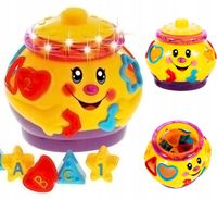 GARNUSZEK Muzyczny INTERAKTYWNY SORTER KLOCKI JEŹDZI ŚPIEWA świeci PREZENT