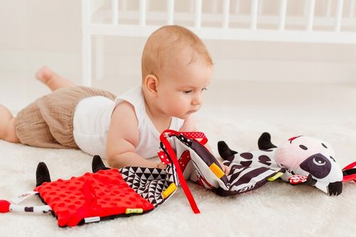 SENSORYCZNA KSIĄŻECZKA HARMONIJKA KRÓWKA 81044 BALIBAZOO na Arena.pl