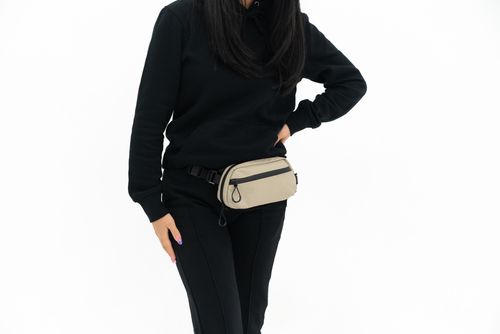 WANDRD nerka biodrowa Tech Pouch Medium zielony na Arena.pl