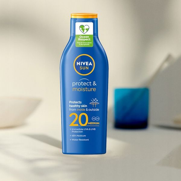 NIVEA SUN Protect & Moisture Balsam do opalania SPF 20, 200 ml zdjęcie 6