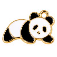Zawieszka emaliowana PANDA miś niedźwiedź 14x22mm biała czarna 1szt.