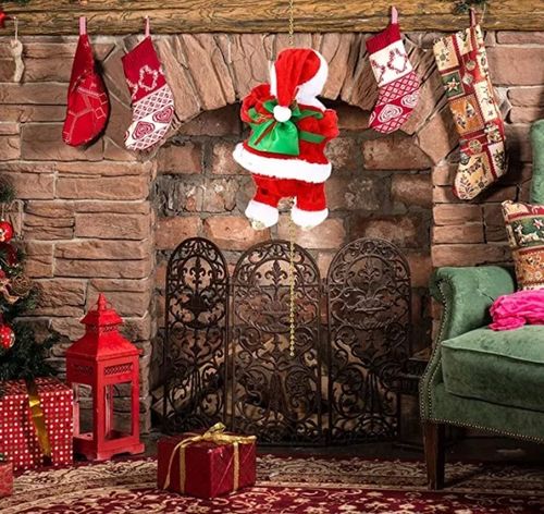 WSPINAJĄCY SIĘ MIKOŁAJ GRA ŚPIEWA ŚWIECI ŚWIĘTA NA PREZENT na Arena.pl